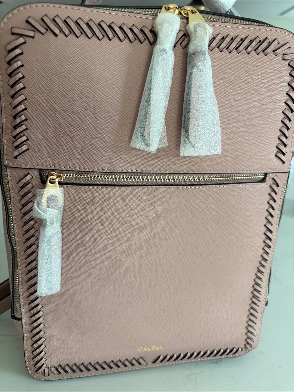 CALPAK backpack
